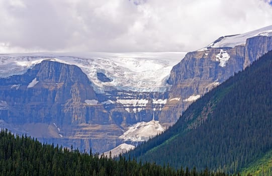 Massive Icefield Falling Over a Mountain Ridge at the Columbia Icefield in Jasper National Park in Alberta