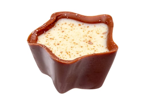 Fine milk chocolate chocolates in the shape of a star filled with creme and white chocolate isolated on a white background. Clipping path. Macro.