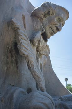 La Albuera, Spain - Jun 12th, 2021: Hans Christian Andersen monument, representing the author writing The Ugly Duckling. Badajoz, Spain.