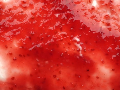 Texture of tasty organic raspberry jam on fresh organic curd using as background