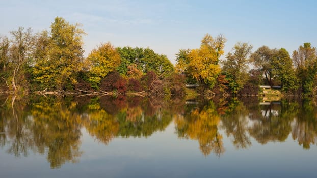 Autumnal scene on lakeshore, Bavaria, Germany