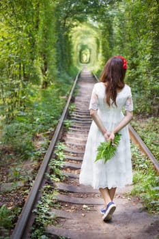 girl holding a fern, tunnel of love