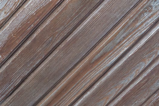 wooden boards arranged diagonally. Wood texture. Dark wood color. Background with copy space