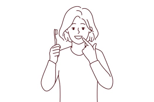 Smiling girl with toothbrush show at white clean teeth. Happy child recommend teeth brushing and oral care. Dental care concept. Vector illustration.