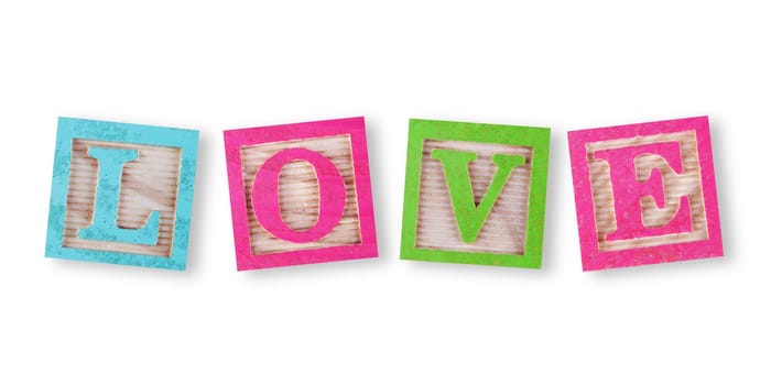 A love concept with childs wood blocks on white with clipping path to remove shadow