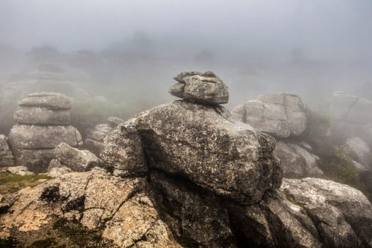 El Torcal De Antequera in dense fog, Malaga, Spain. Unusual stunning rock formation