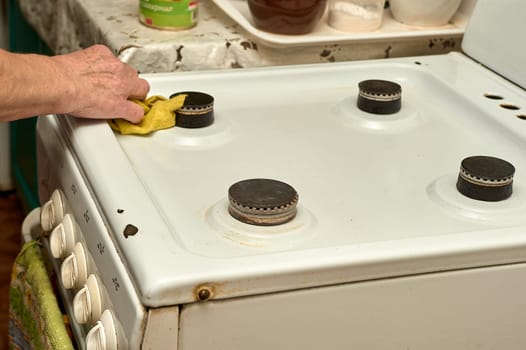 wet cleaning of the gas stove. High quality photo