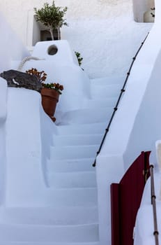 Narrow stone steps, a traditional piece of architecture on the island of Santorini. Greece