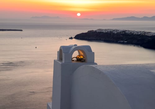 Whitewashed houses at sunset in Imerovigli on Santorini island, Cyclades, Greece