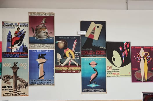 Venice, Italy - September 6, 2022:  59th Venice Art Biennale in Venice. Old posters advertising the Venice Biennale presented in the central pavilion in Giardini