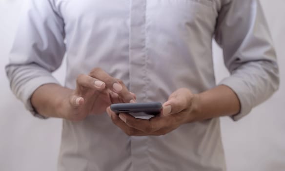 Global internet connection application and technology digital marketing, Financial and banking, Businessman using smart phone mobile on blurred background