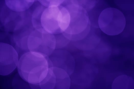 Light abstract dark bokeh christmas circle color glitter blurred black background