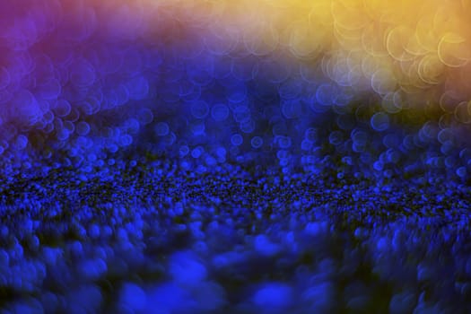 Light abstract dark bokeh christmas circle color glitter blurred black background