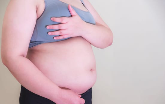 Fat woman, Shape up healthy stomach muscle, and diet lifestyle, to reduce belly concept.