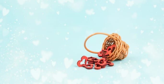 Wicker basket with a red hearts, greeting card for valentines day, mothers day or birthday, love and emotion