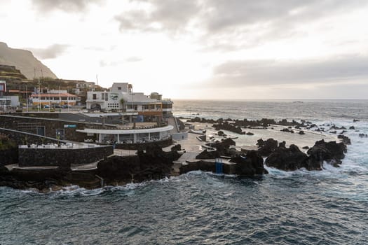 Madeira/Portugal - July 13 2021 Swimming pool of volcanic lava in Porto Moniz.
