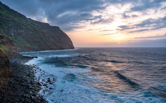 Sunset on the coast at the Town Porto Moniz on the Island of Madeira