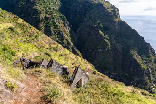 The abandoned house in the mountains near the ocean. Madeira island, Portugal.