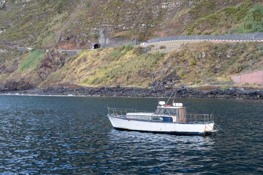 Motor boat in the coast of Porto Moniz. Madeira island