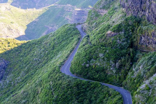A picturesque winding road in the mountains of Madeira Island, Portugal