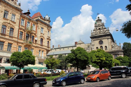 street in Lviv with many parked cars in the central part