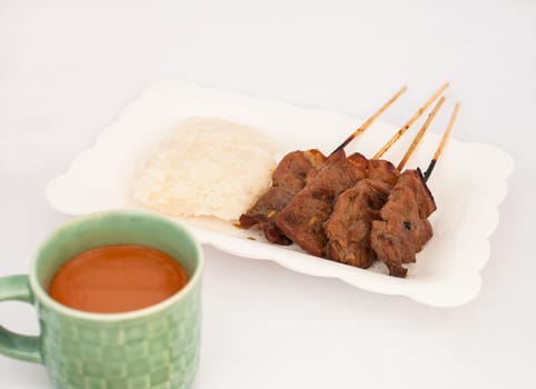 Thai-style roasted pork, grilled pork, pork steak, barbecue pork on skewers (Moo Yang, Mu Ping) shoot soft focus