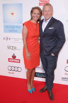 Jonica Jahr (initiator) and Johannes B. Kerner,charity event "The little heart in the center"" at the Curio Haus,Hamburg,14.06.2015"