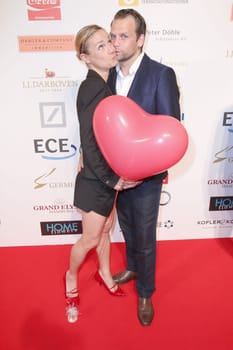 Rhea Harder me husband Joern,charity event "The little heart in the center"" at the Curio Haus,Hamburg,14.06.2015"