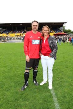 The initiators Dr. Thomas Mir and Jonica Jahr,The charity football game Kicking with heart in the stadion Hoheluft,Hamburg,14.06.2015