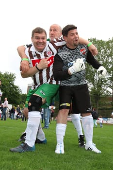 Elton and Tim Maelzer with Peter Lohmeyer,The charity football game Kicking with heart at the Stadion Hoheluft,Hamburg,14.06.2015