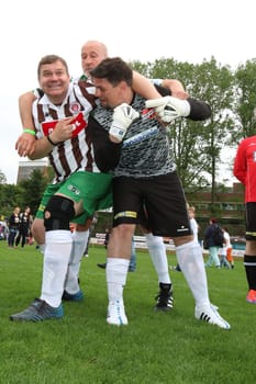 Elton and Tim Maelzer with Peter Lohmeyer,The charity football game Kicking with heart at the Stadion Hoheluft,Hamburg,14.06.2015