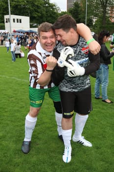 Elton and Tim Maelzer,The charity football game Kicking with heart at the Stadion Hoheluft,Hamburg,14.06.2015
