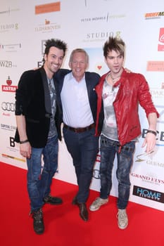 Chris and Andreas Ehrlich (magician) with Johannes B. Kerner,charity event "The little heart in the center"" at the Curio Haus,Hamburg,14.06.2015"
