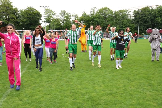 Fernanda Brandao waking up with Peter Lohmeyer,Annabelle Mandeng in the background,The charity football game Kicking with heart in the Stadion Hoheluft,Hamburg,14.06.2015