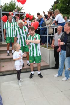 Johannes Oerding (famously only takes the medal that was intended for the children),The charity football game Kicken mit Herz im Stadion Hoheluft,Hamburg,14.06.2015