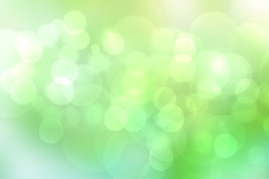 Abstract gradient light blue turquoise yellow green shiny blurred background texture with circular bokeh lights. Beautiful fresh backdrop. Space for design.