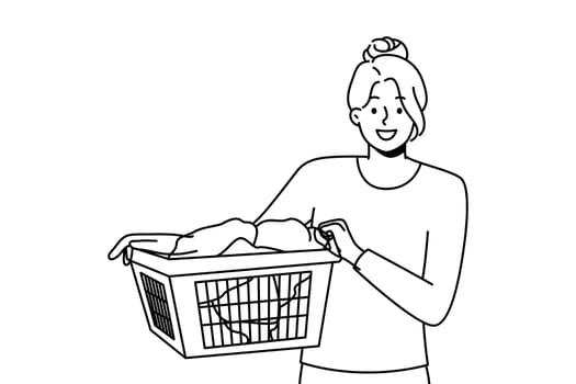 Smiling young woman with basket with clothes going to laundry. Happy girl cleaning clothing in laundromat. Vector illustration.