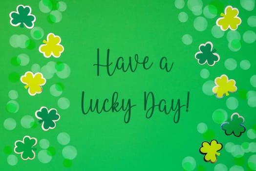 Green Flat Lay With English Text Have A Lucky Day Paper Background With Saint Patricks Day Decoration.