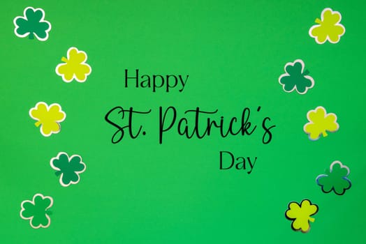 Flat Lay With English Text Happy St. Patrick's Day. Green Paper Background With Saint Patrick's Day Decoration.