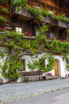 A traditional Austrian mountain farm house in the alpine village of Doelsach, East Tyrol, Austria