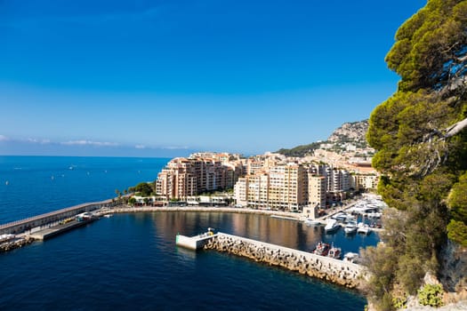 Montecarlo, Monaco - August 2022: panoramic view of the Fontvielle port with blue sky and sea