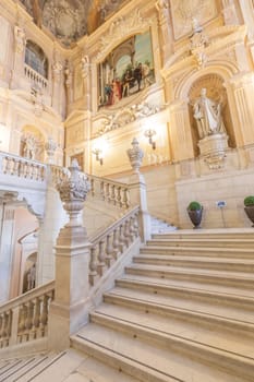 Turin, Italy - Circa January 2022: Royal Palace entrance - luxury elegant marble stairway