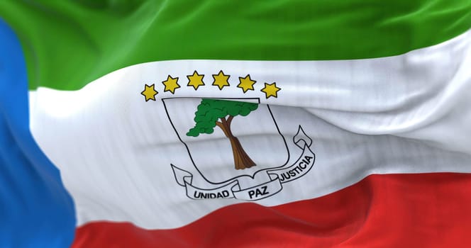 National flag of Equatorial Guinea waving in the wind. The Republic of Equatorial Guinea is a Central African State. Rippled fabric. Textured background. Selective focus. Realistic 3d illustration