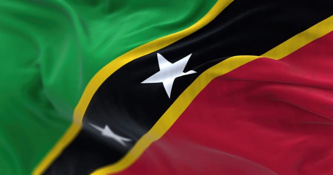 Saint Kitts and Nevis national flag waving. Saint Kitts and Nevis Federation is an island state in Central America. Rippled fabric. Textured background. Selective focus. Realistic 3d illustration