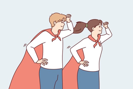 Guy and girl in superhero capes look into distance with their hands to their foreheads. Young man and woman in superhero uniforms for charity or volunteer organizations metaphor. Flat vector image