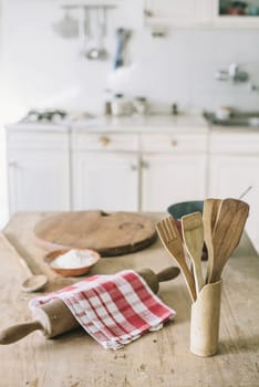 Vintage kitchen interior with kitchen utensils prepared for cooking