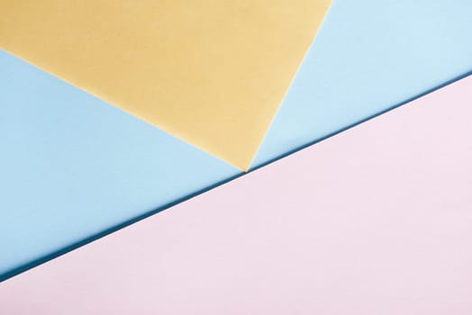 Abstract pastel geometry creative background top view. Modern and trendy minimal geometric paper composition. Flat lay minimalist layout.