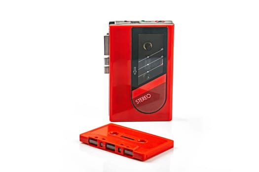 Beautiful red vintage audio cassette player over white background