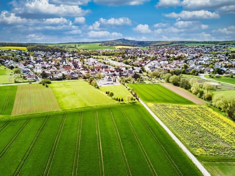 Drone shot from german landscape with meadows and small village