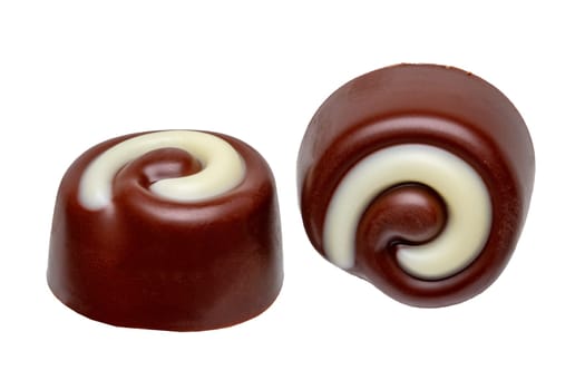 Chocolate candy or delicious truffle balls isolated on a white background. Macro. Christmas or other holidays. Gourmet chocolate bonbons.